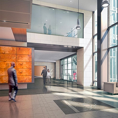 a large lobby with people walking through it