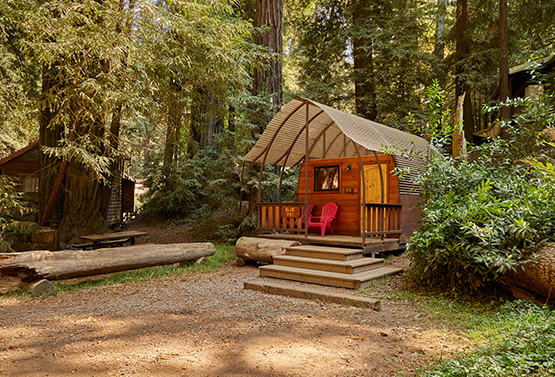 view of a cabin in the forest at big sur campgrounds