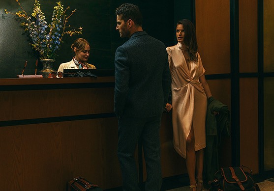 Couple checking in at the lobby