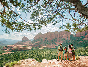 family of four overlooking a canyon