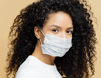 Closeup of a woman wearing a mask