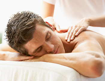 Man getting a massage at the spa