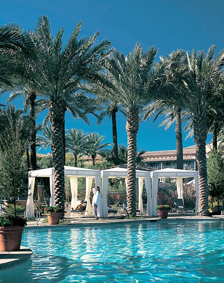 white cabanas poolside