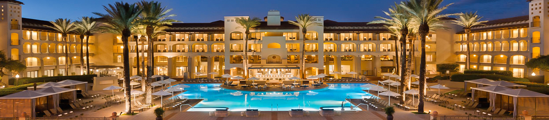 sparkling princess pool set against the evening sky