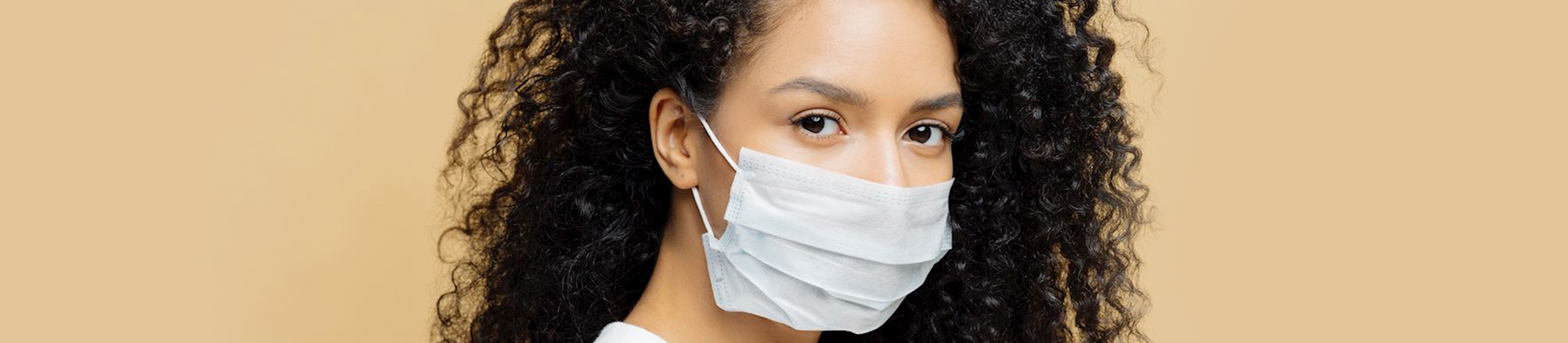 Closeup of a woman wearing a mask