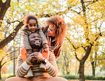family of three at the park