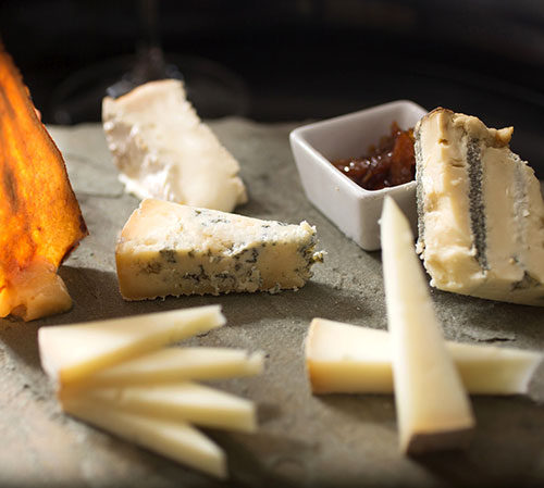Board with a variety of cheese 