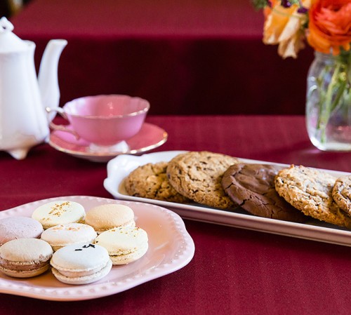 cookies and macaroons on table with flowers-1
