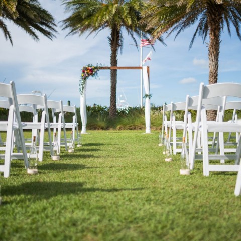 chairs lined up for wedding aisle