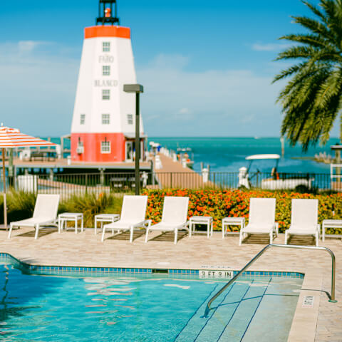 pool with lighthouse in the background