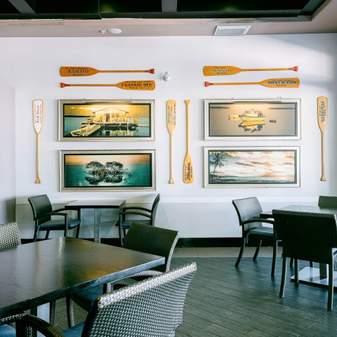 interior restaurant with paintings in background