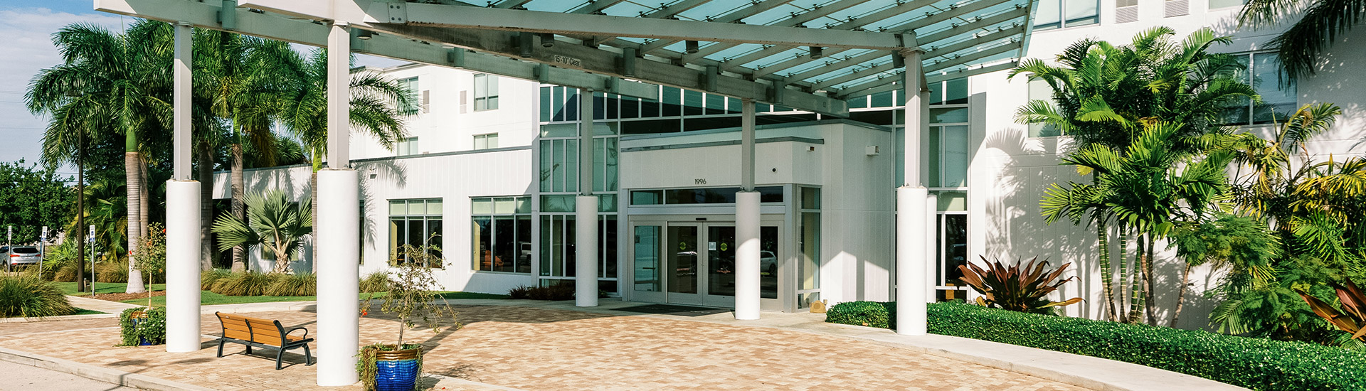 faro blanco resort entrance of white building