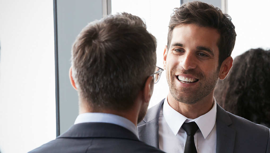 two men networking