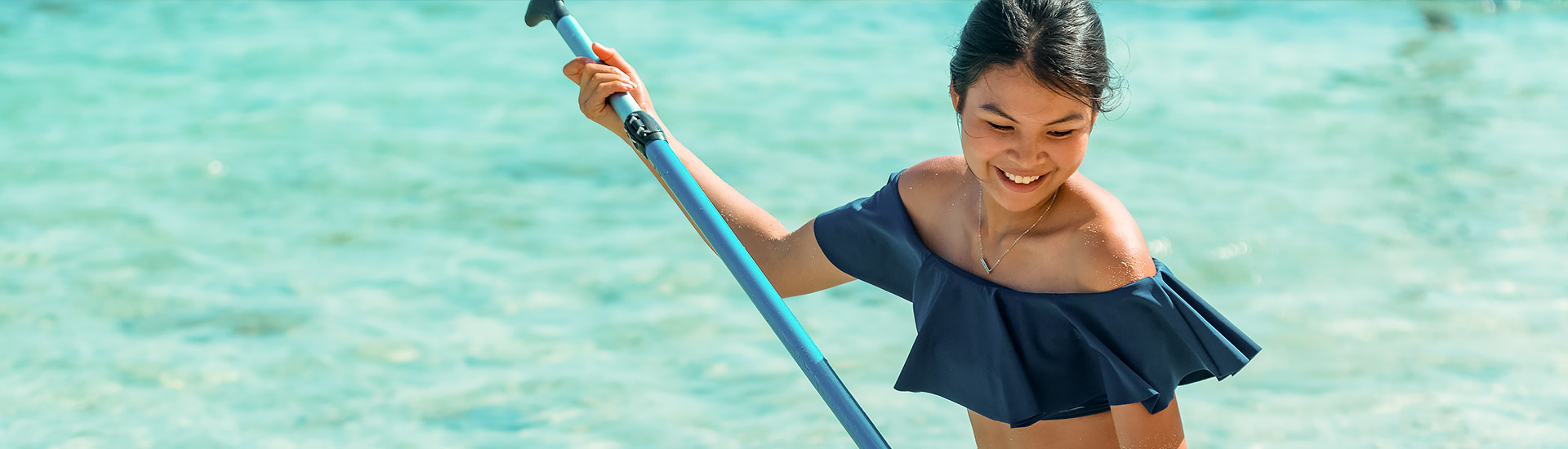woman paddleboarding
