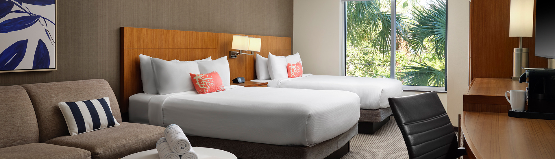 Internal view of a room with two big beds