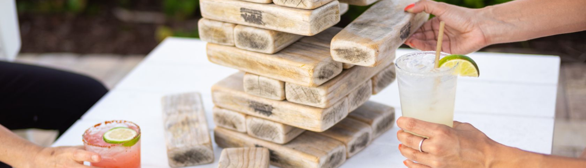 game of Jenga and with drinks
