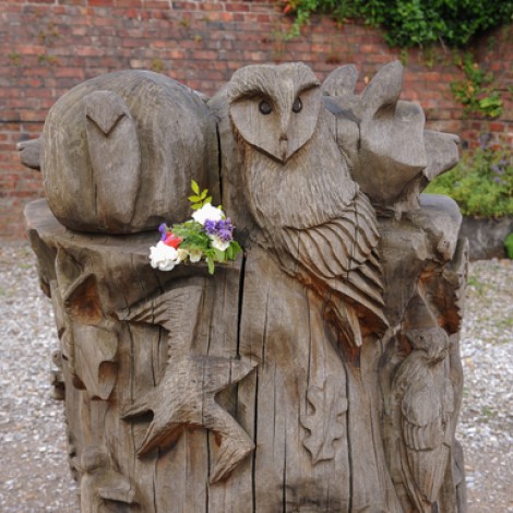 wooden sculpture of owls