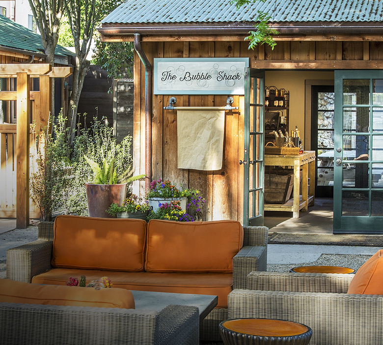 exterior view of the bubble shack with orange outdoor seating