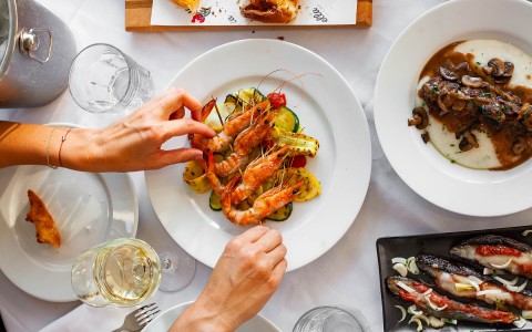 a plate of prawns and vegetables on a plate 