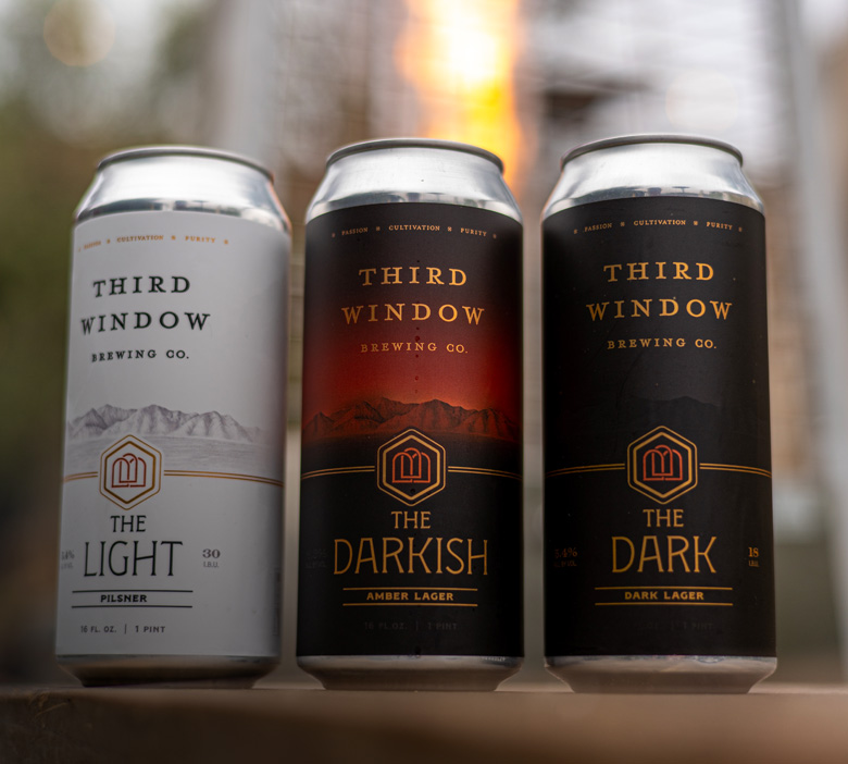three cans of third window beer
