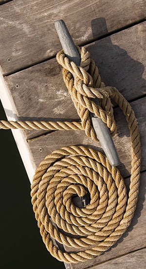 thick boat rope on the marina deck