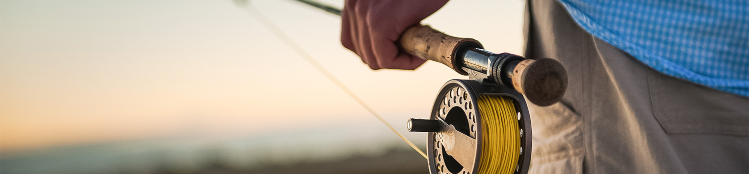 hand holding a fishing pole