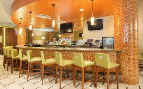 bar with green barstools