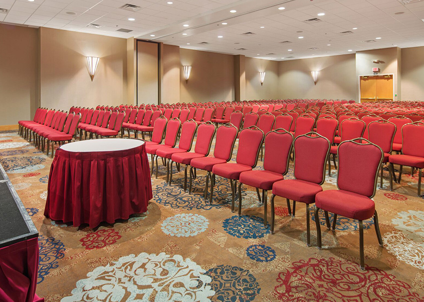 rows of red chairs at the venue