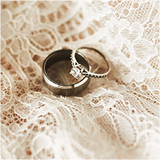 close up of the brides and grooms wedding rings