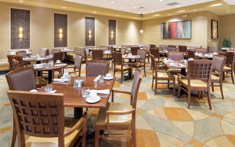large open dining area with tables and chairs