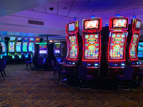 Internal view of a casino full of slot machines