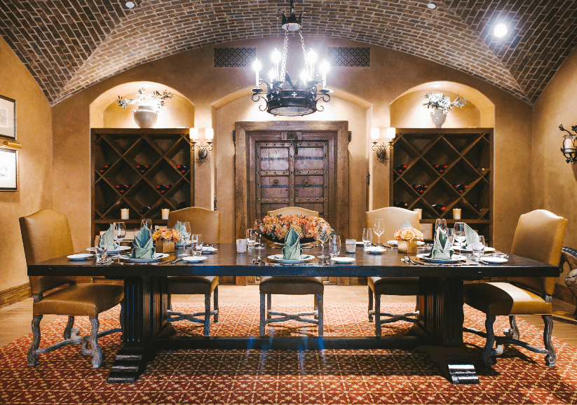 Dining room with long table and leather chairs