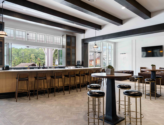 clubhouse kitchen with high stools and tall tables
