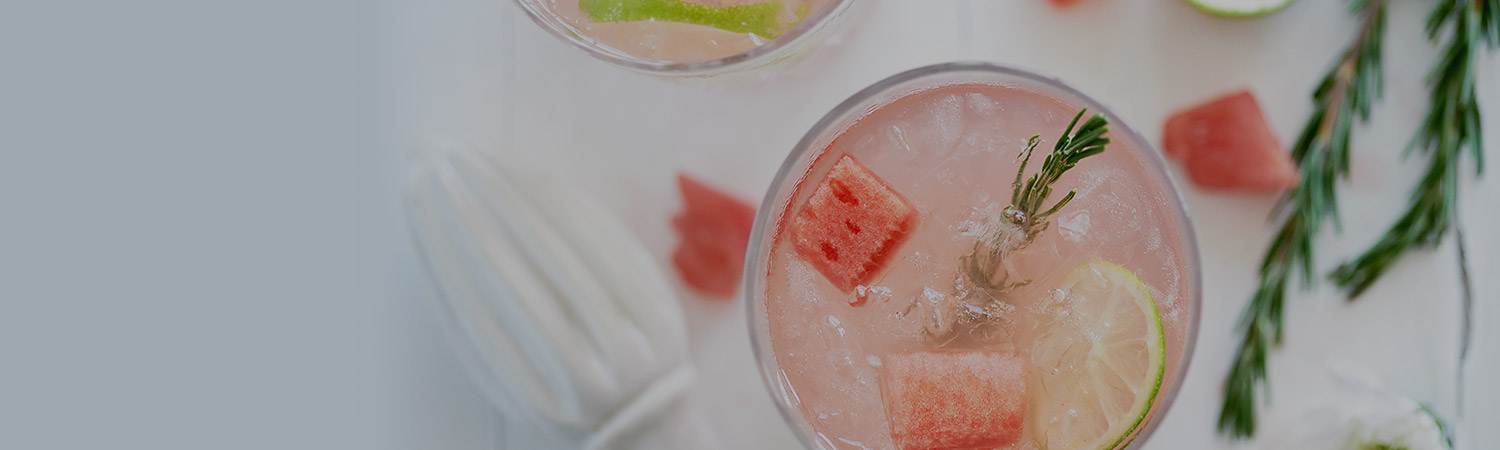 watermelon cocktail with rosemary garnish