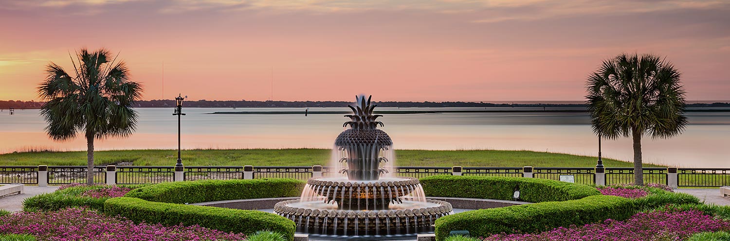 Beautiful landscaping and fountain at sunset