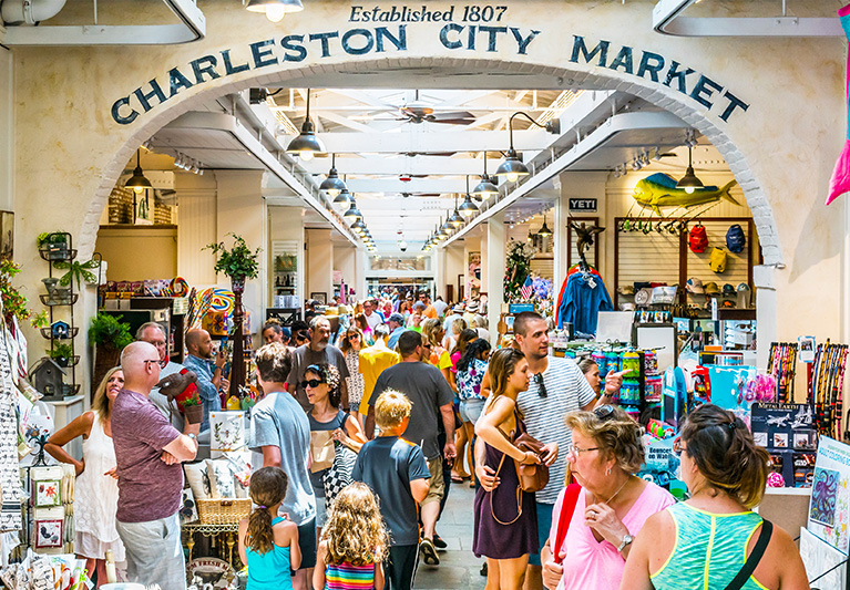 Charleston city market with people looking at merhcnadise