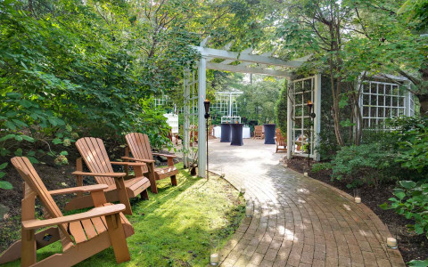 outdoor walkway with lounge chairs