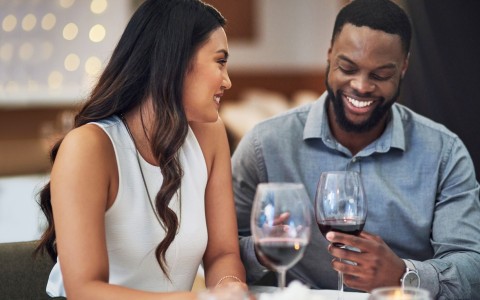 couple dining with wine