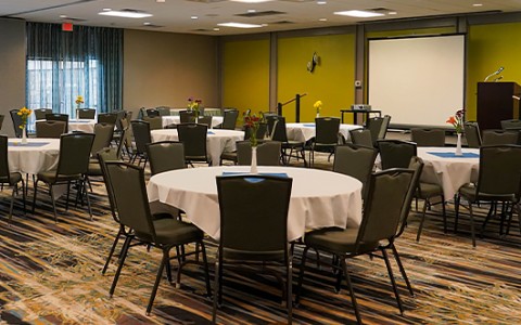 circular meeting tables in the event space