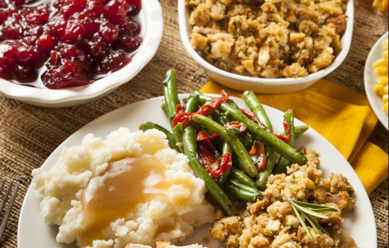 Thanksgiving dinner with turkey, potatoes, stuffing & green beans