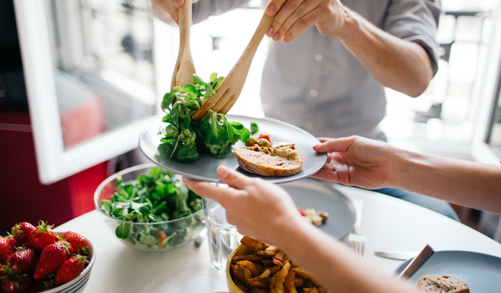 serving up a pinch of salad on a plate