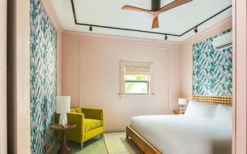 view of suite with pink walls