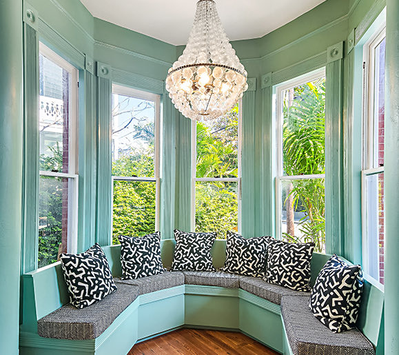 view of a seating area with green walls