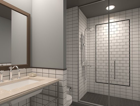 Interior of a bathroom with a white subway tile walk in shower, tub, mirror, and sink area
