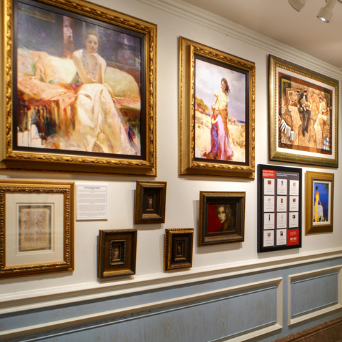 view of various art paintings on the wall