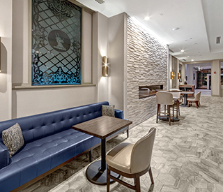 view of a lounge with a blue bench