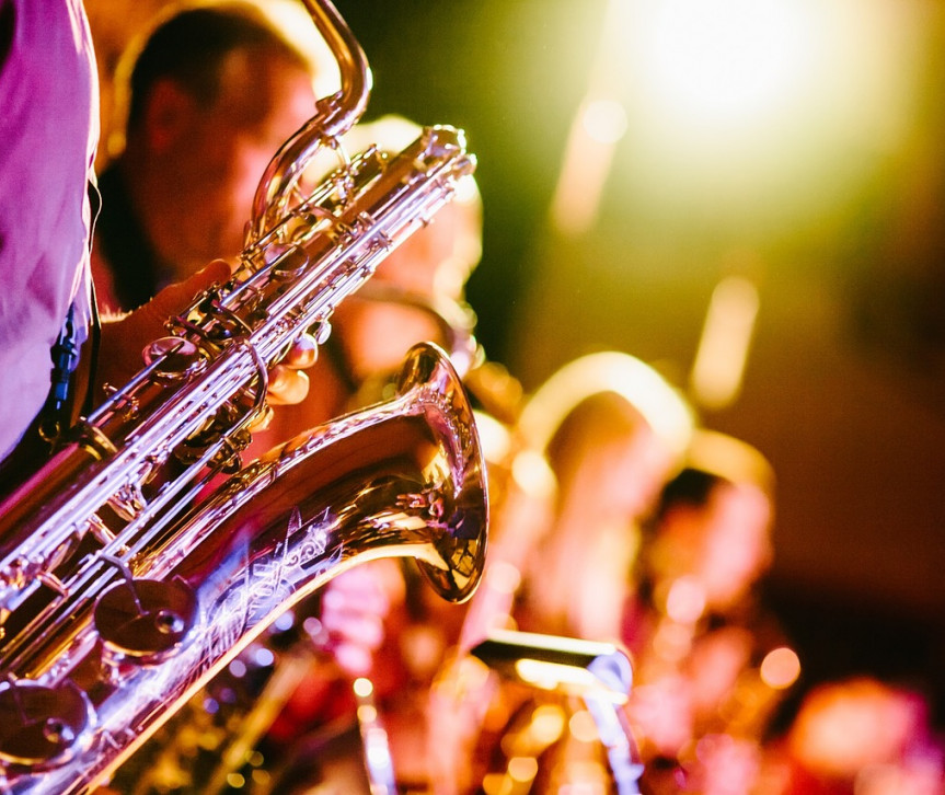 a close up of a row of musicians