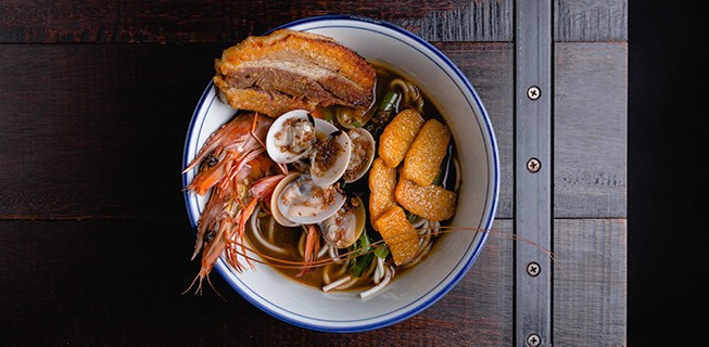 shrimp and oysters and other food in a bowl