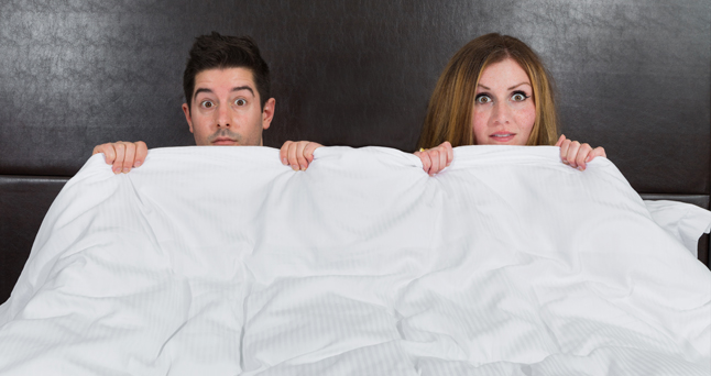 couple under sheets