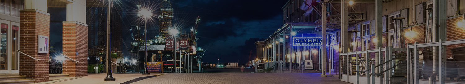 A street of buildings at pier 21 lit up at night